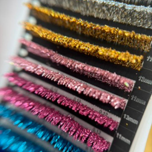 Up close view of Gold Glitter lashes, Pink,Blue ,Hot Pink and Sliver 11mm and 13mm